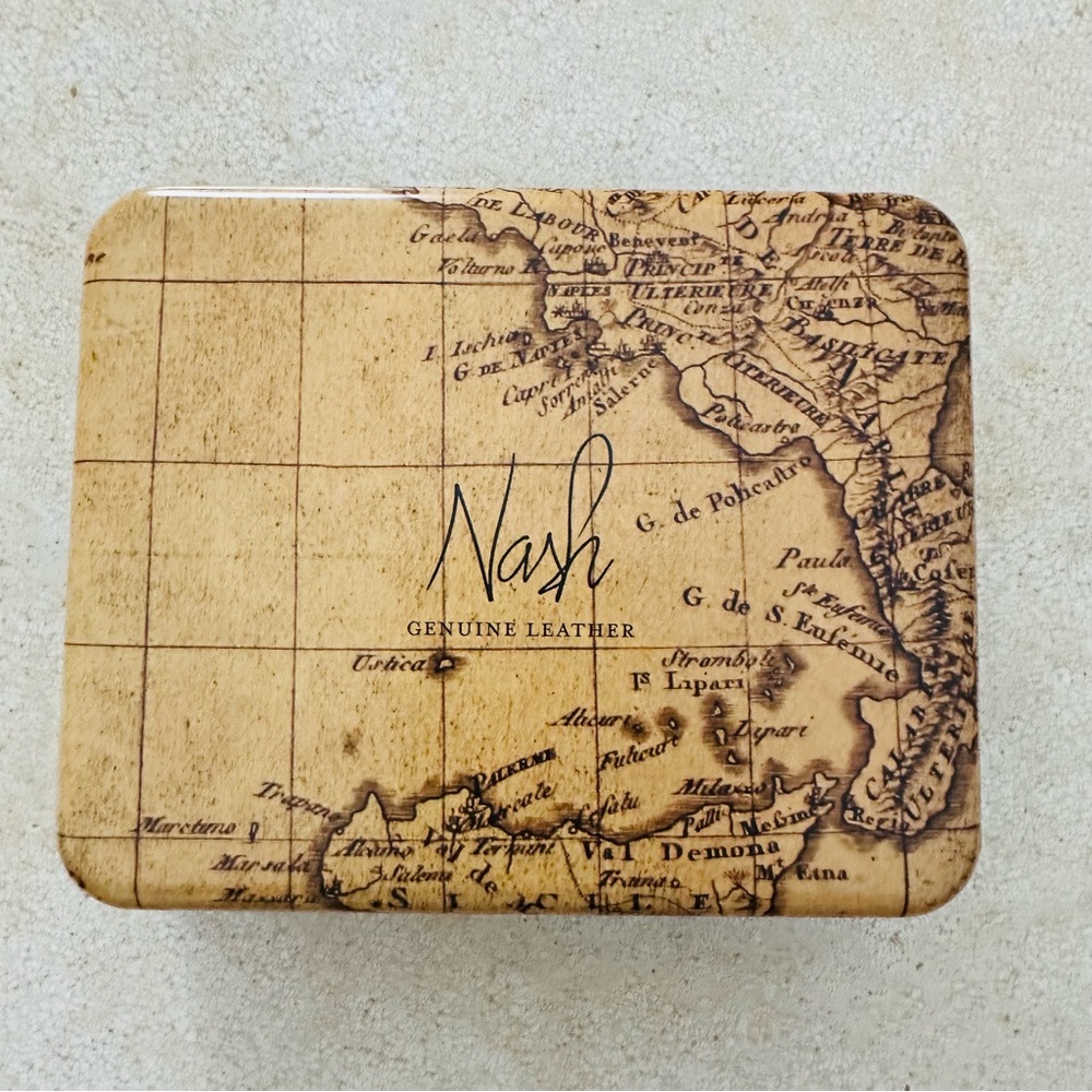 Nash Men’s wallet in brown leather.  9 1/4” open 
3” x 4” folded NWT